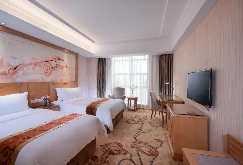 Vienna International Hotel Luogang Wanda Plaza Гуанчжоу Екстер'єр фото
