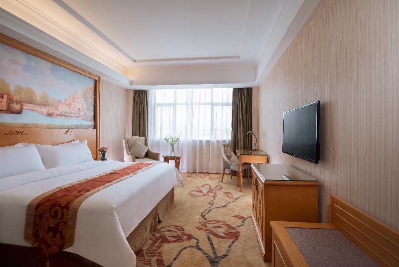 Vienna International Hotel Luogang Wanda Plaza Гуанчжоу Екстер'єр фото